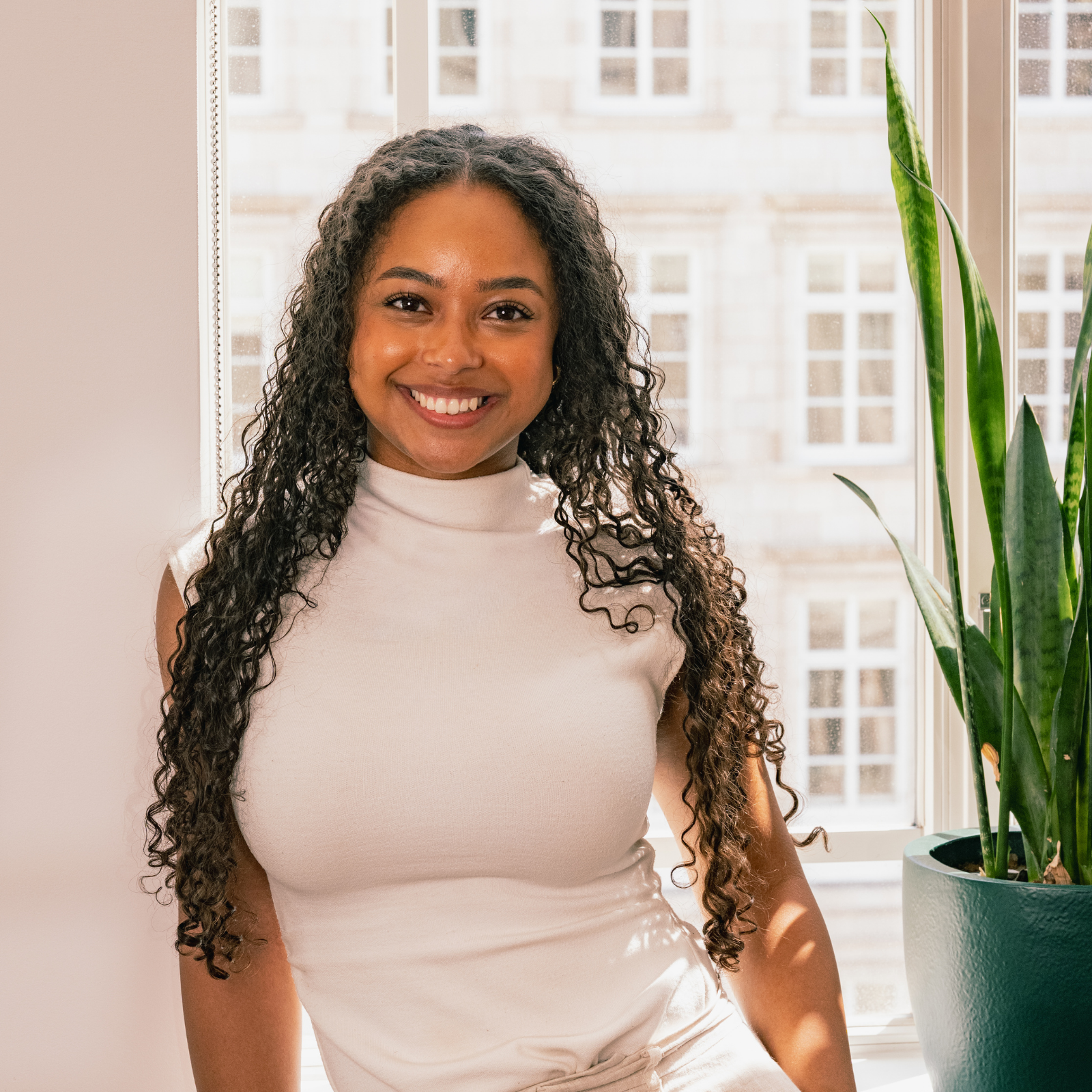Headshot of Nadia Alves Firing, Associate at Erevena